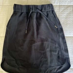 Set of TWO Lululemon drawstring skirts, size 4